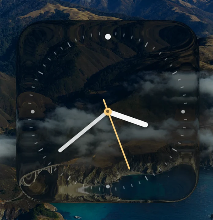 Analogue clock widget on a Mac lock screen