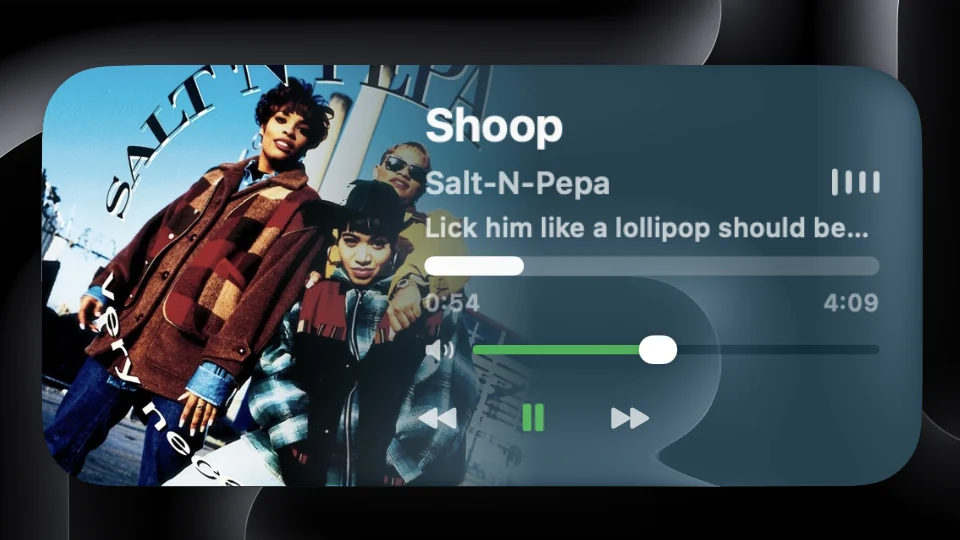 Now Playing widget with album art, track title and playback controls on a Mac lock screen