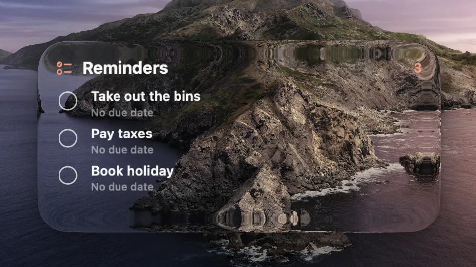 Reminders widget listing three tasks with tick boxes on a Mac lock screen